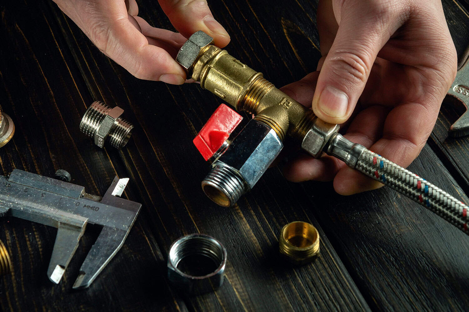 Pipe fitting installation for plumbing repairs and maintenance.