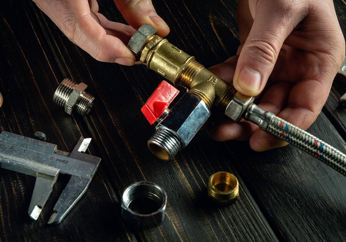 Pipe fitting installation for plumbing repairs and maintenance.